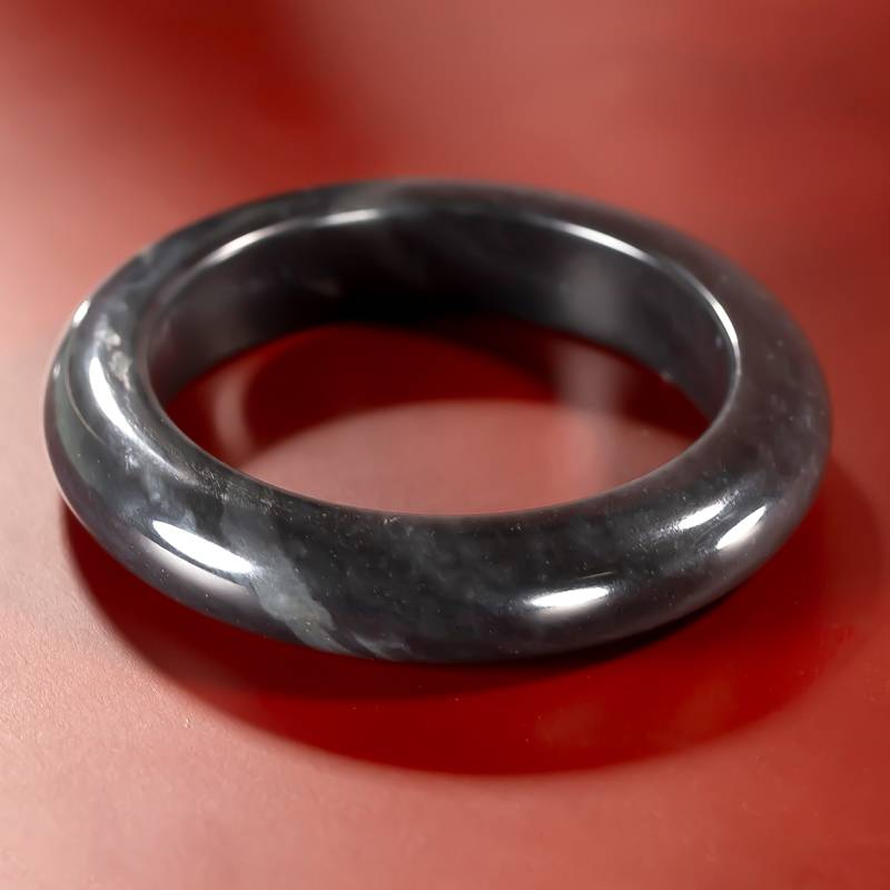 Xinjiang Hetian qinghua seed jade bangle with natural pitted skin, 80.5 g, 57.5 mm - Yufu Jade detail photograph 2
