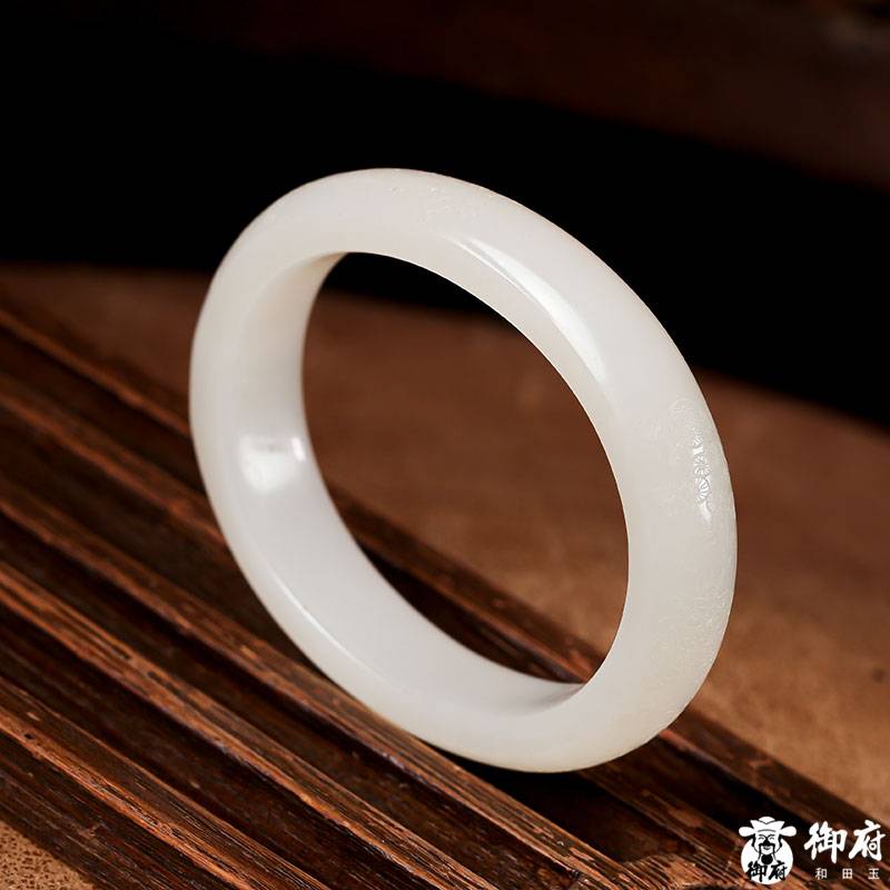 Xinjiang Hetian white seed jade oval bangle with natural skin, 59 g, 61 mm - Yufu Jade