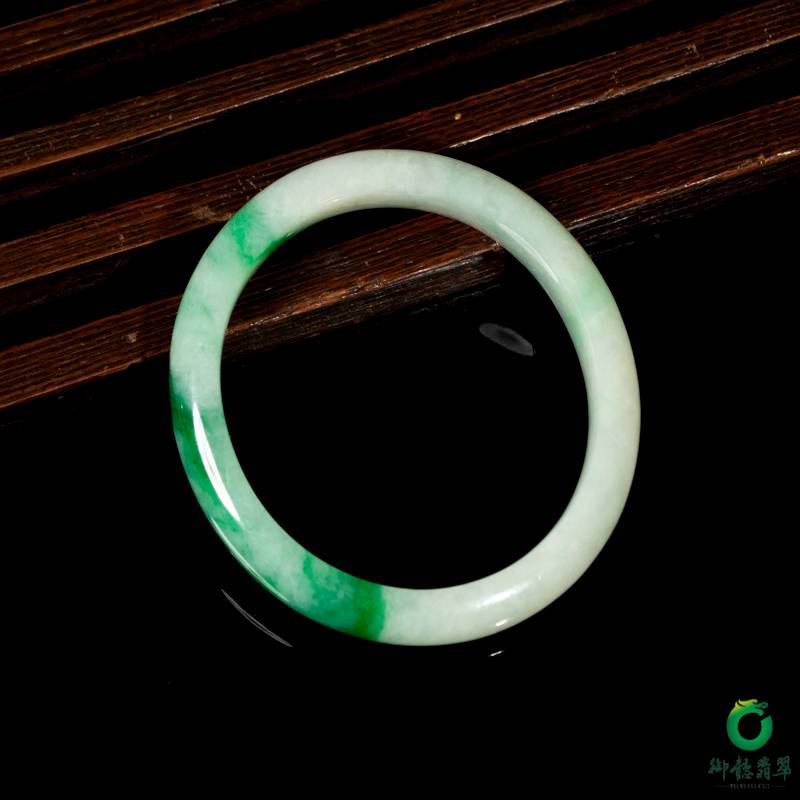 Burmese jadeite A-grade oval bangle in floating green (Guifei style), 43.7 g, 52 mm - Yufu Jade detail photograph 2